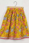 Girls Yellow Peplum Top With Yellow Floral Lehenga And Dupatta